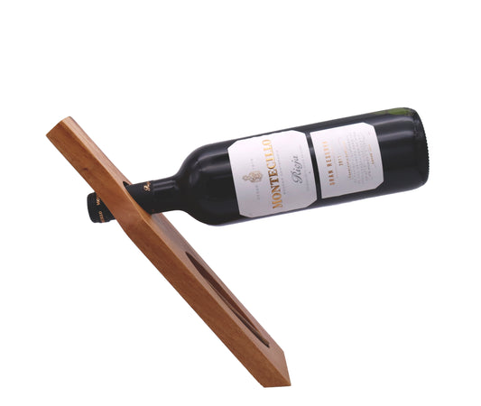 Wine bottle on a wooden stand with Montecarlo label against a white background