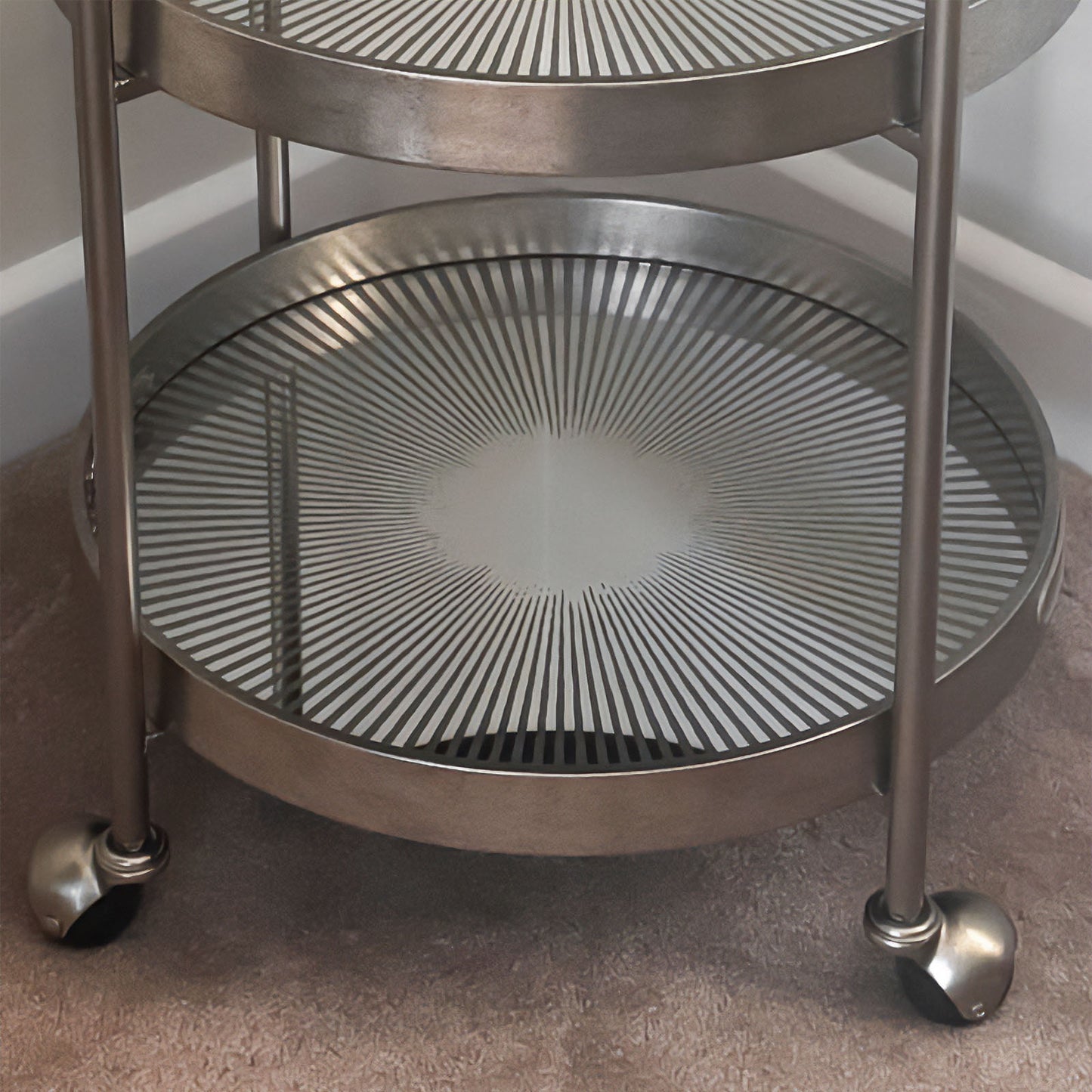 Drink silver trolley with wheels on it