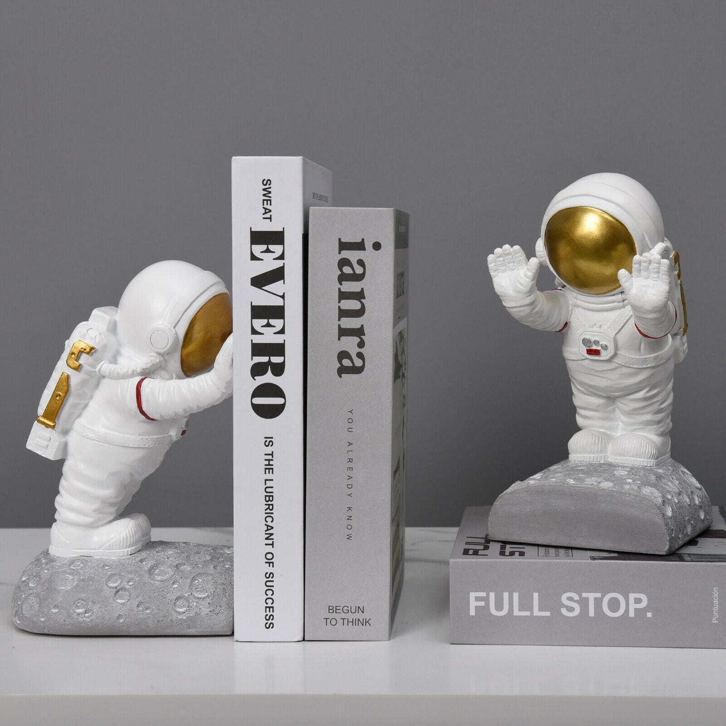 Pushing Astronaut Decorative Bookends