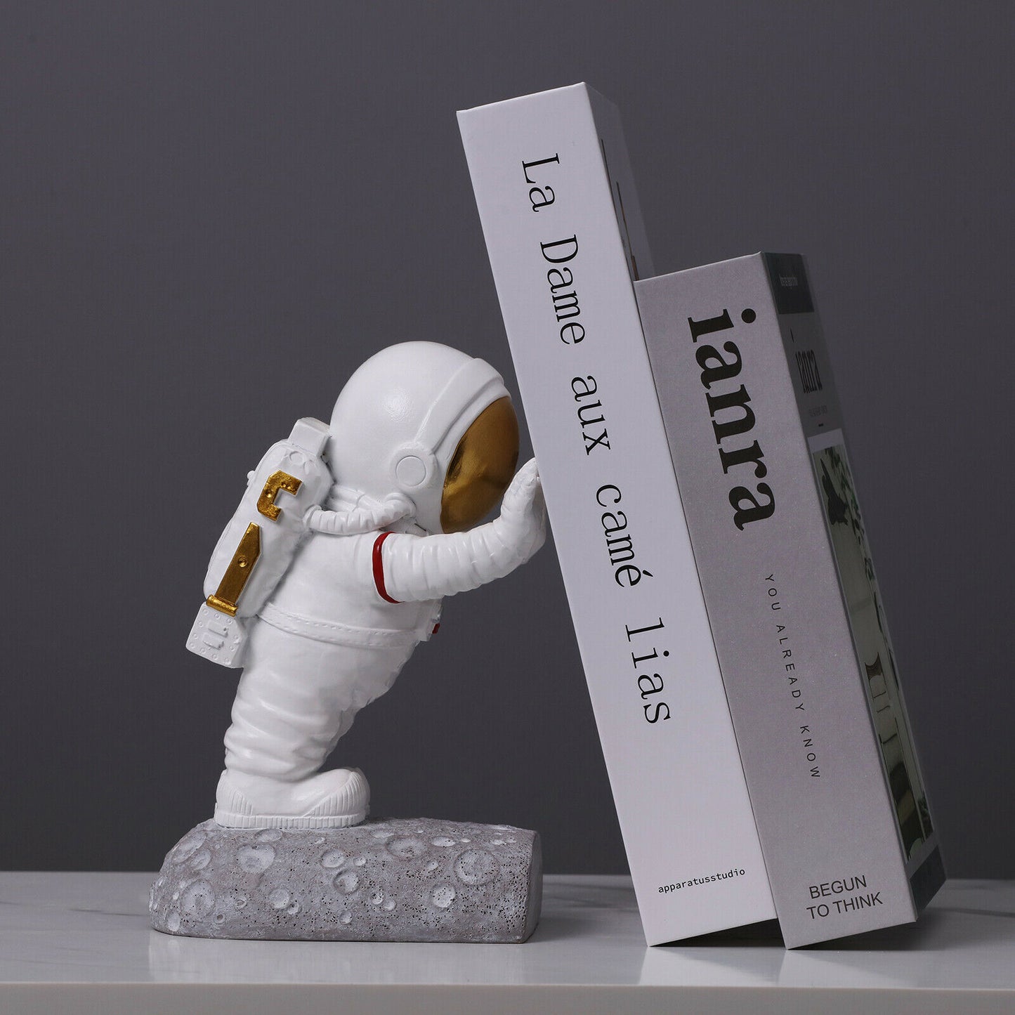 Pushing Astronaut Decorative Bookends