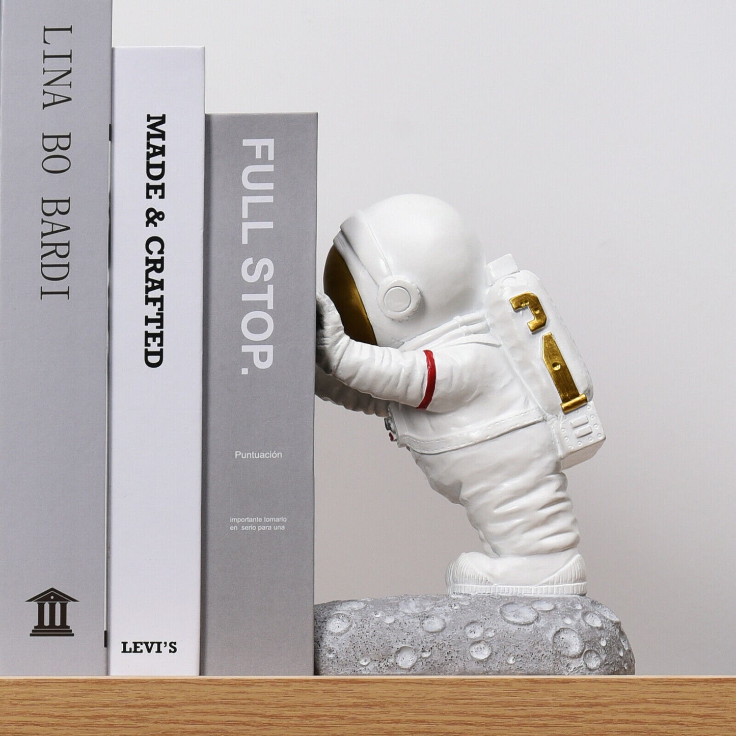 Pushing Astronaut Decorative Bookends