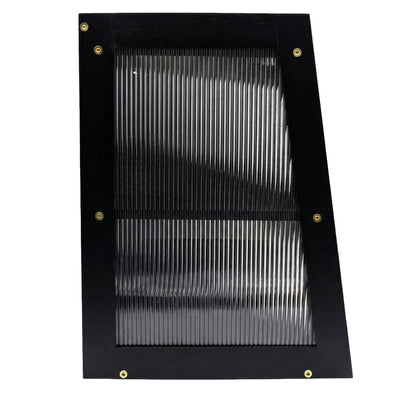 Black metal grille with vertical slats on a white background