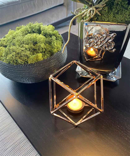 Abstract Metal Hexagonal Candle Holder With Tealight on Table