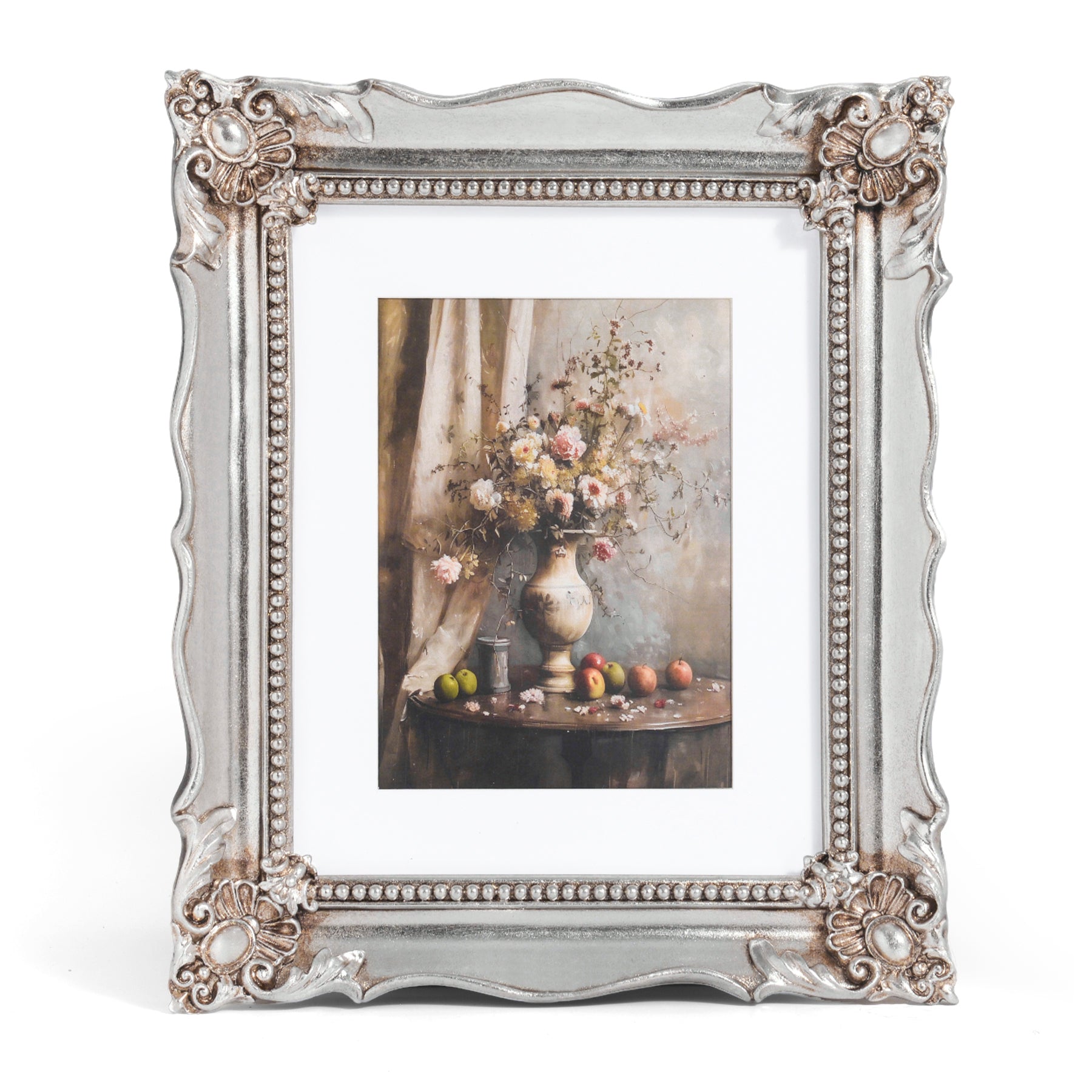 Decorative silver frame with a floral still life painting inside