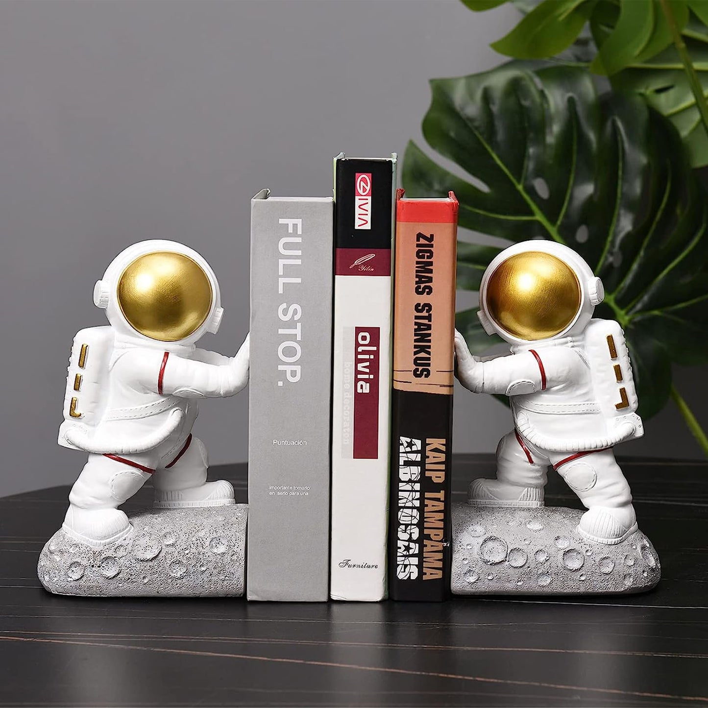 Pushing Facing Astronauts Bookends