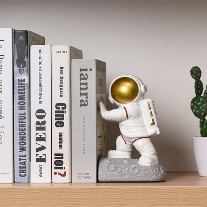 Pushing Facing Astronauts Bookends