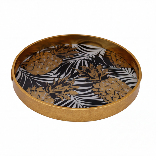 Round decorative tray with pineapple and leaf pattern on a white background