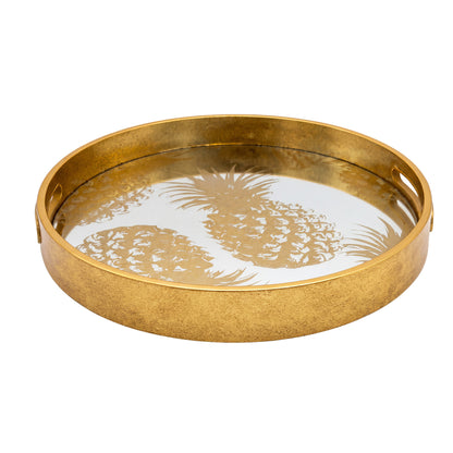 Gold round tray with pineapple design on a white background